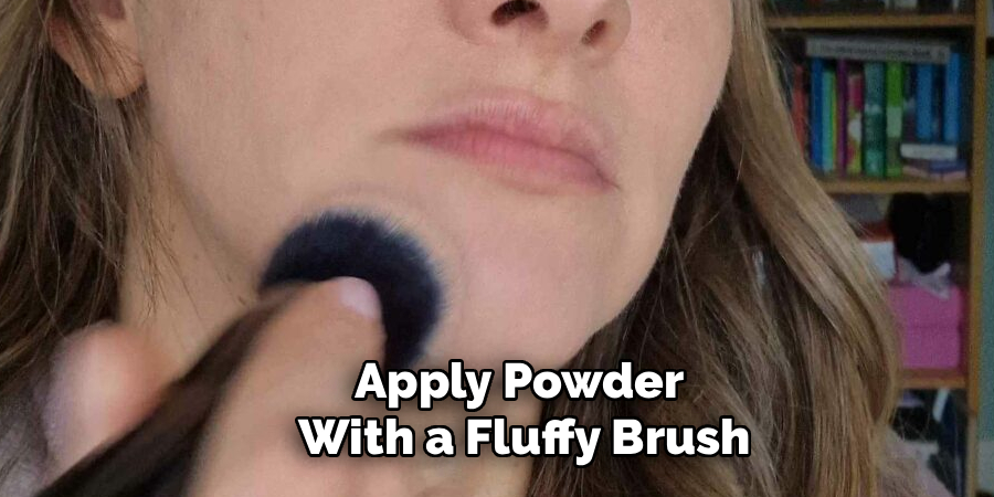 Apply Powder 
With a Fluffy Brush