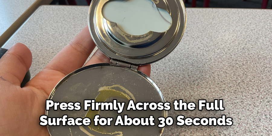 Press Firmly Across the Full 
Surface for About 30 Seconds