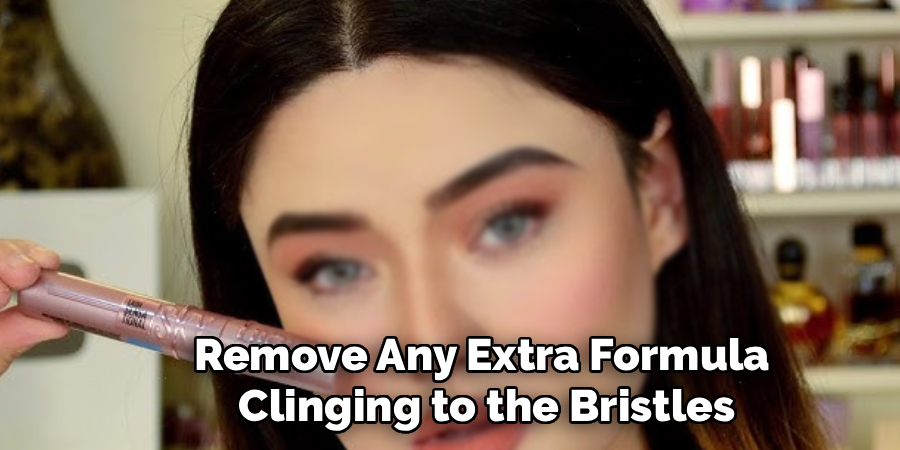 Remove Any Extra Formula
Clinging to the Bristles