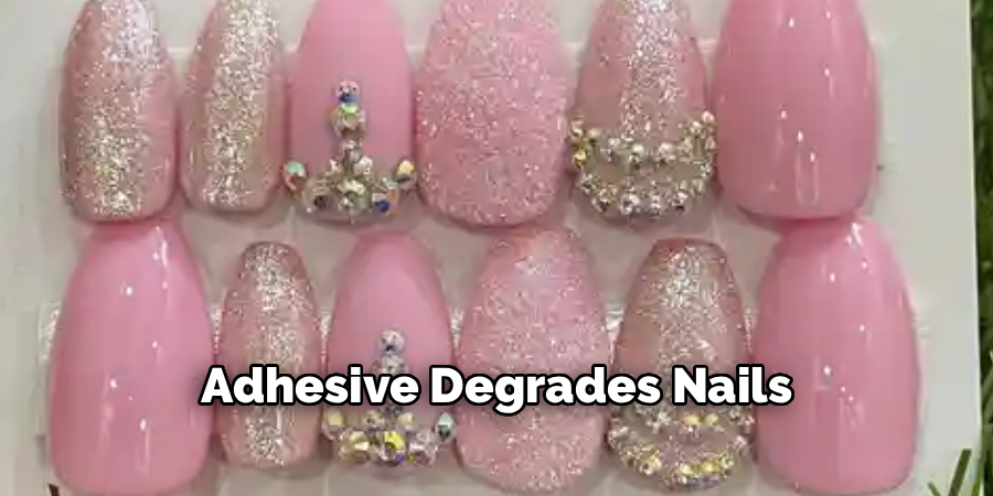 Adhesive Degrades Nails