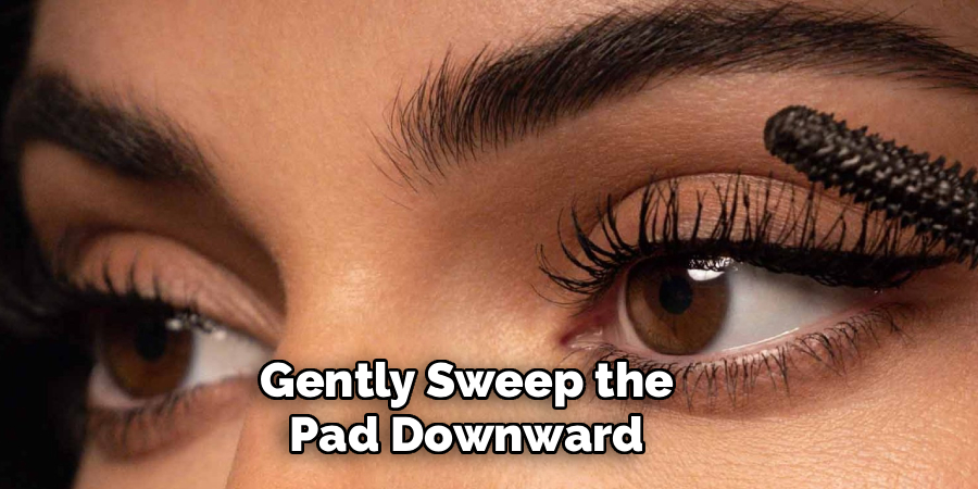 Gently Sweep the Pad Downward