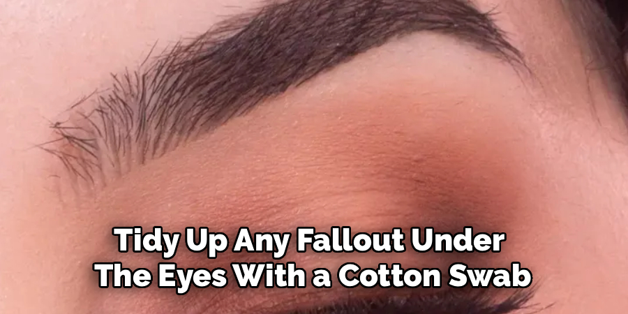 Tidy Up Any Fallout Under
The Eyes With a Cotton Swab